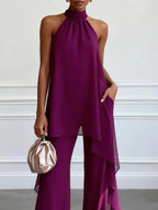Conjunto Carolina | top elegante sin mangas de color morado con pantalones