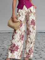 Silvia | Chaleco sin mangas rosa y pantalones anchos con estampado floral