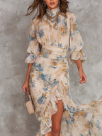 Rita | Vestido largo de gasa asimétrico con estampado floral y cuello alto, color beige