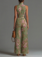 Carla | Mono sin mangas de gasa verde con estampado floral, cremallera y pliegues, de corte ancho
