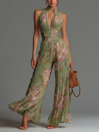 Carla | Mono sin mangas de gasa verde con estampado floral, cremallera y pliegues, de corte ancho