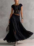 Francesca | Top de encaje negro transparente y falda maxi plisada